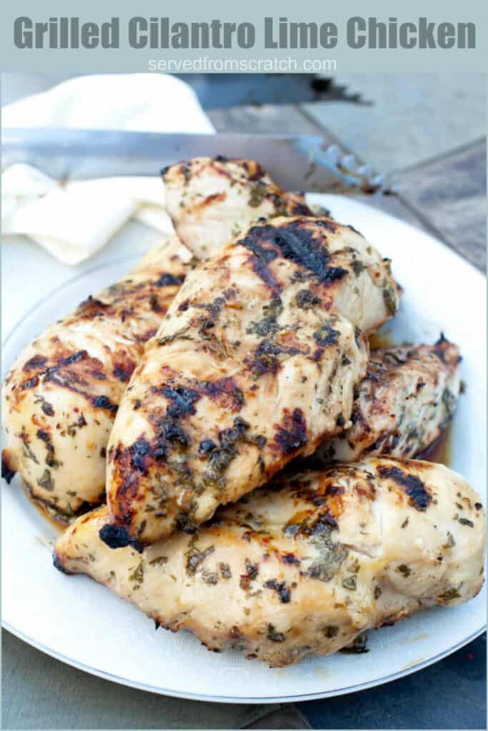a plate of grilled chicken with Pinterest pin text.