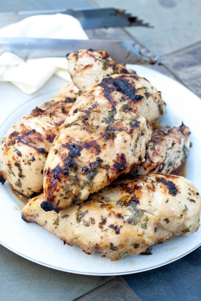 a plate of grilled chicken 