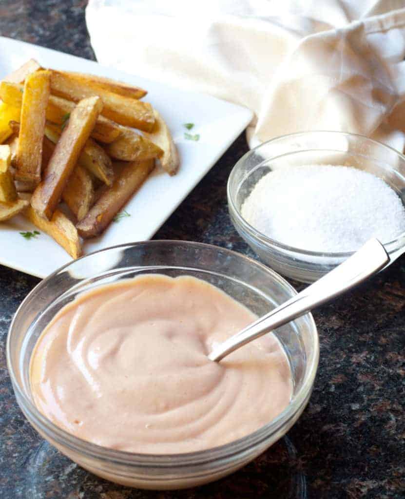 a bowl of fry sauce with a spoon.