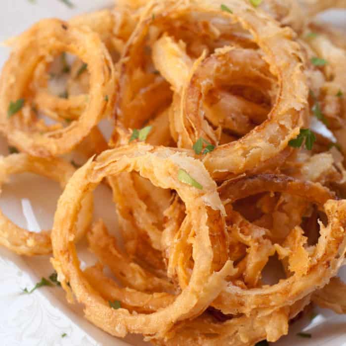 baked crispy onion rings from scratch on a plate