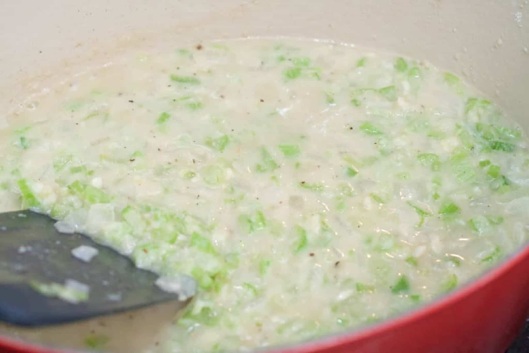 a dutch oven of celery soup.