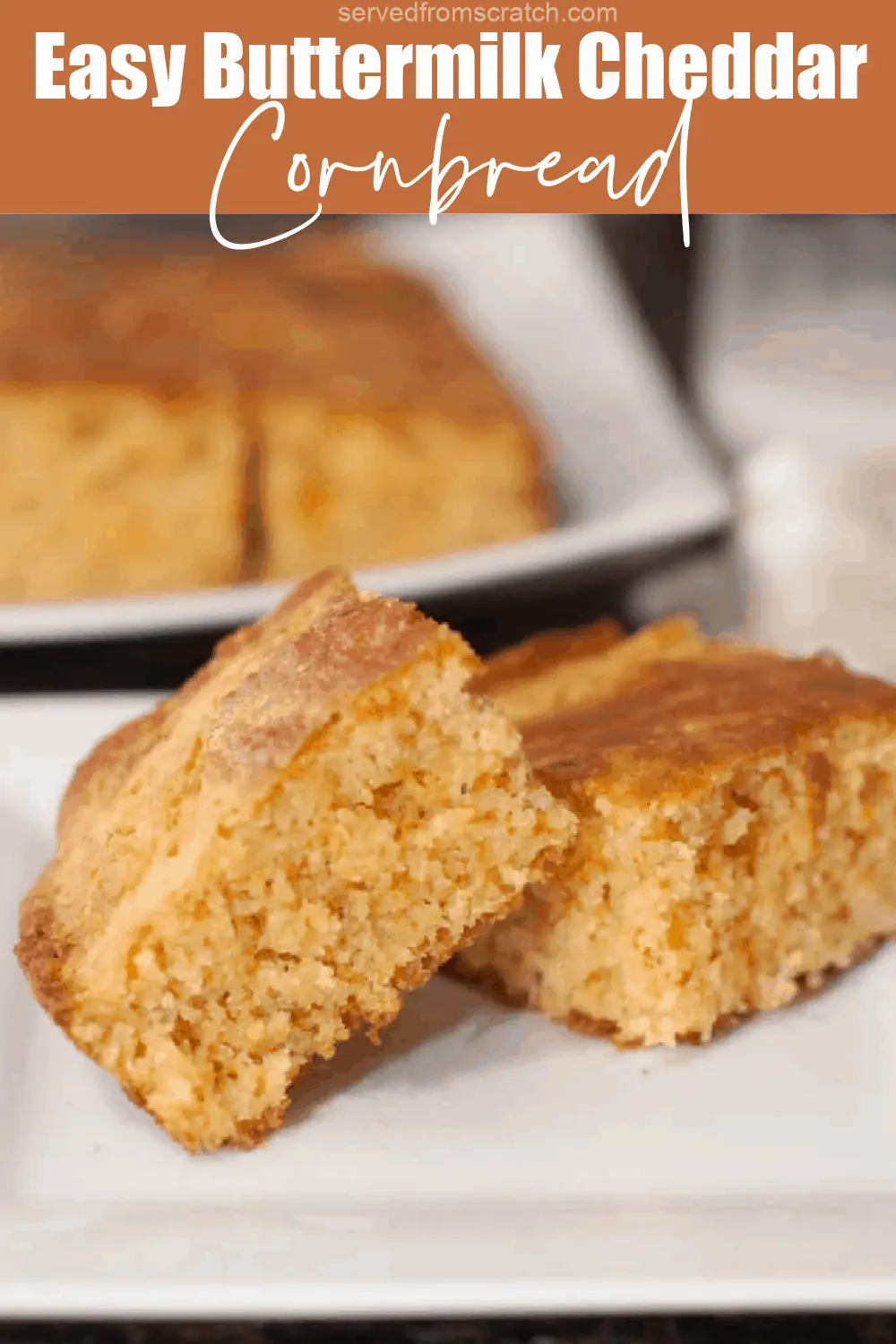 a plate with two pieces of cornbread.