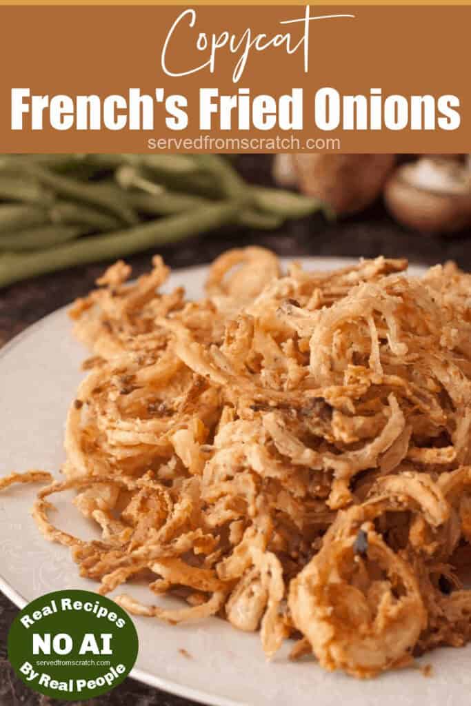 a plate of fried onions with Pinterest pin text and NO AI sticker.