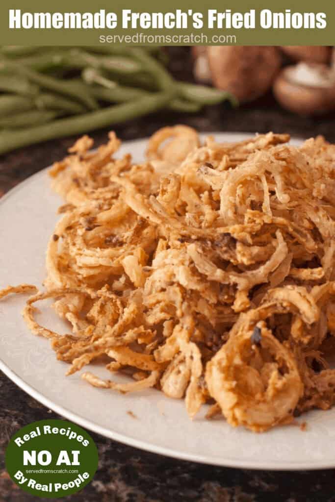 a plate of fried onions with Pinterest pin text and NO AI sticker.