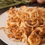 cooked frenches fried onions on a plate