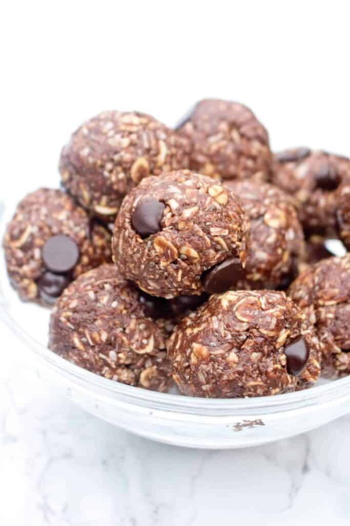 chocolate peanut butter energy balls in a bowl.