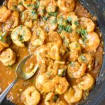 This Super Easy Coconut Curry Shrimp is full of flavor, has a great spicy kick, and is easy and simple enough for a weeknight meal! #shrimp #easy #recipe #thai #coconutshrimpcurry #curry