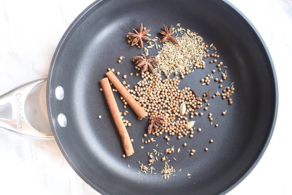 spices in a saute pan