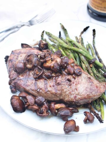 a steak with mushrooms