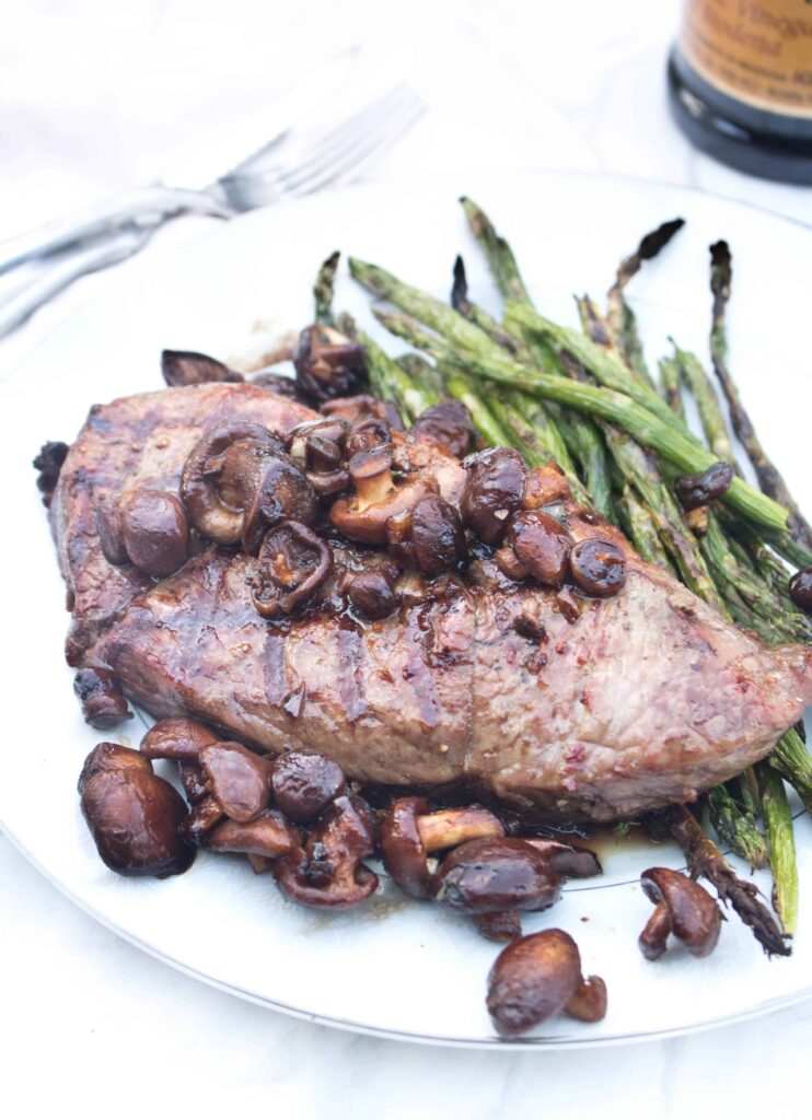 a steak with mushrooms