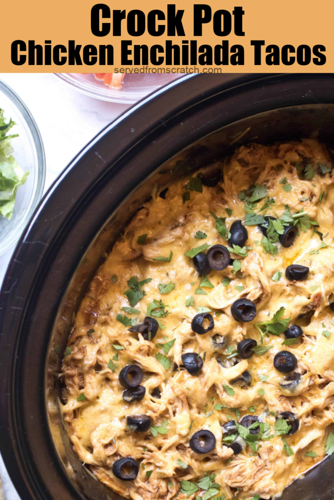 an overhead of shredded chicken, cheese, and olives in a crock pot with Pinterest pin text.