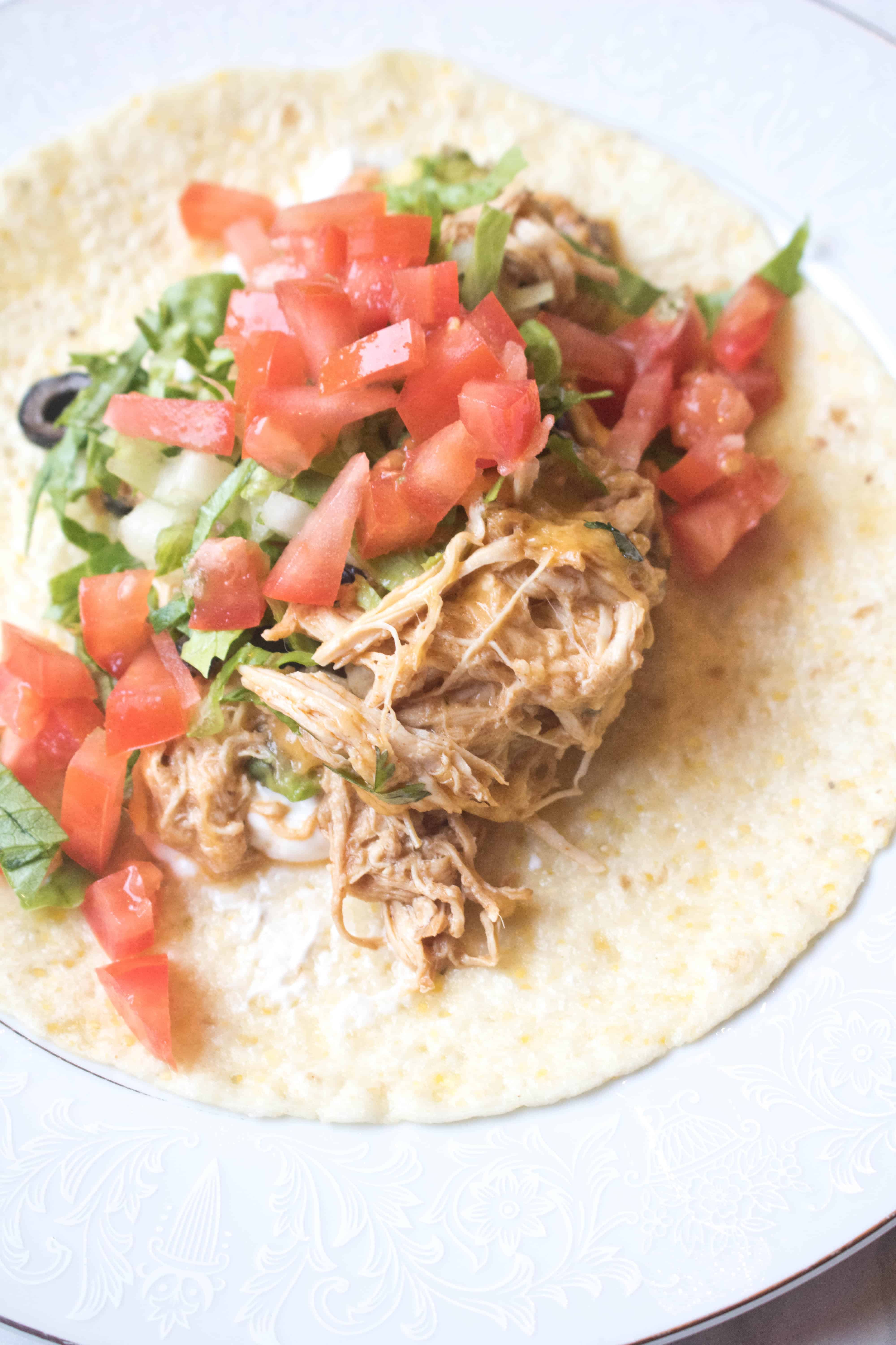 chicken tacos with lettuce and tomatoes 