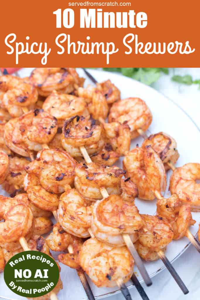 a plate of grilled shrimp skewers with Pinterest pin text and NO AI sticker.