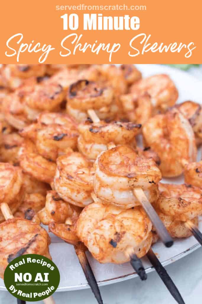 a plate of grilled shrimp skewers with Pinterest pin text and NO AI sticker.