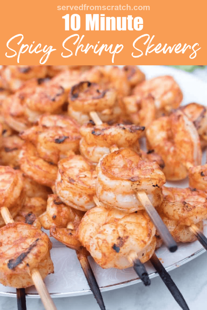 a plate of grilled shrimp skewers and Pinterest pin text.