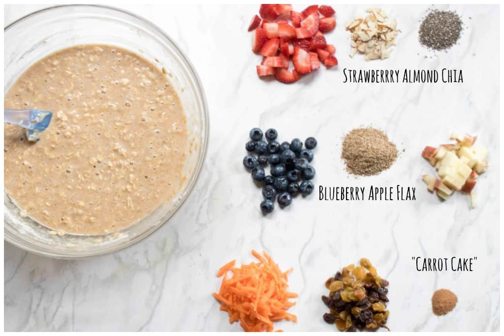 muffin mix in a bowl with fruit mixtures laid out next to it