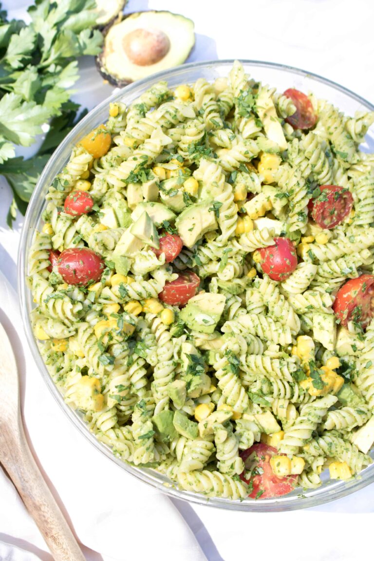 overhead of a bowl of green pasta salad