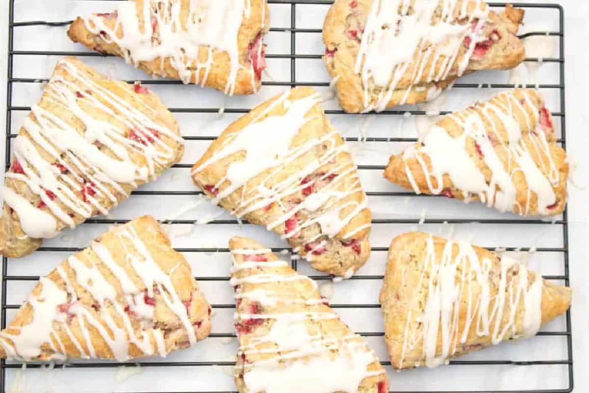 glazed scones on a cooling rack.