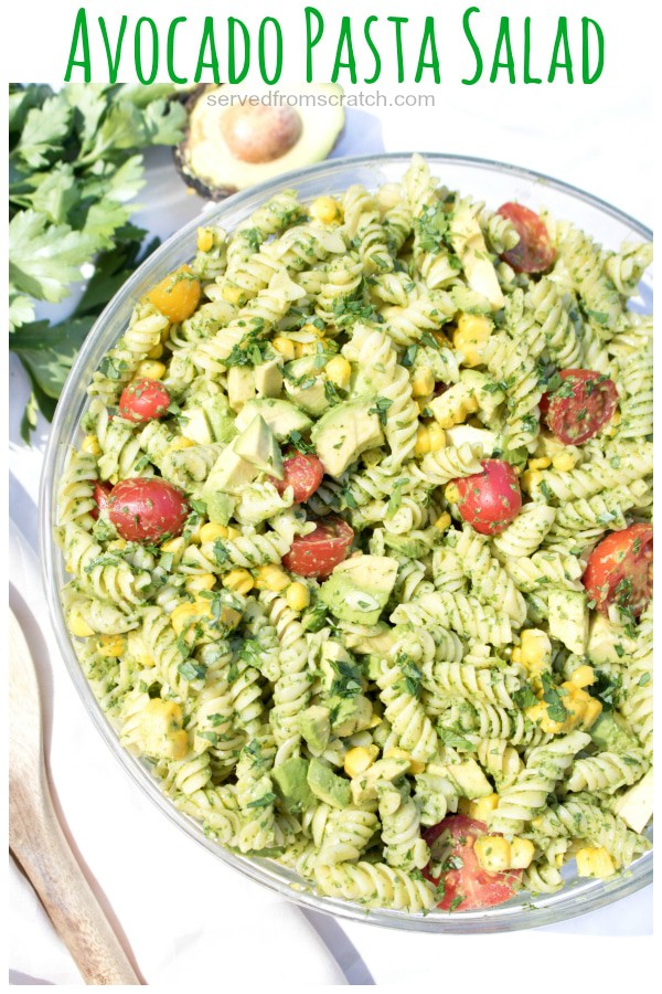 an overhead of green avocado salad with Pinterest pin text.