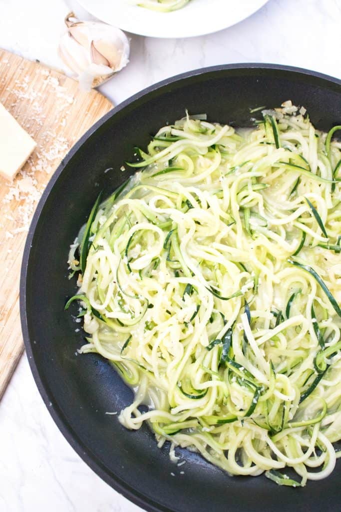 Saute pan of garlic parmesan zoodles