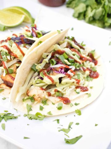 Try a new twist on your tacos by balancing sweet and spicy with one of our new favorites: Sweet Sriracha Chicken Tacos! #chickentacos #recipe #sriracha #easy #sweetandspicy