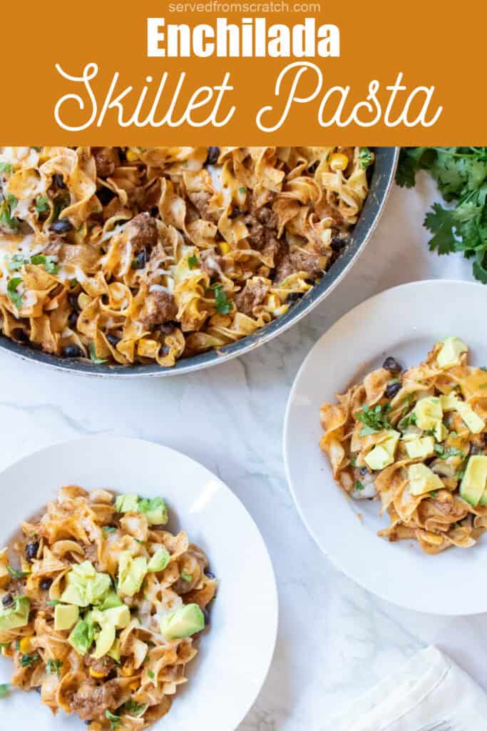 an overhead of a cheesy pasta skillet with beef and beans and two bowls of the pasta topped with diced avocado.