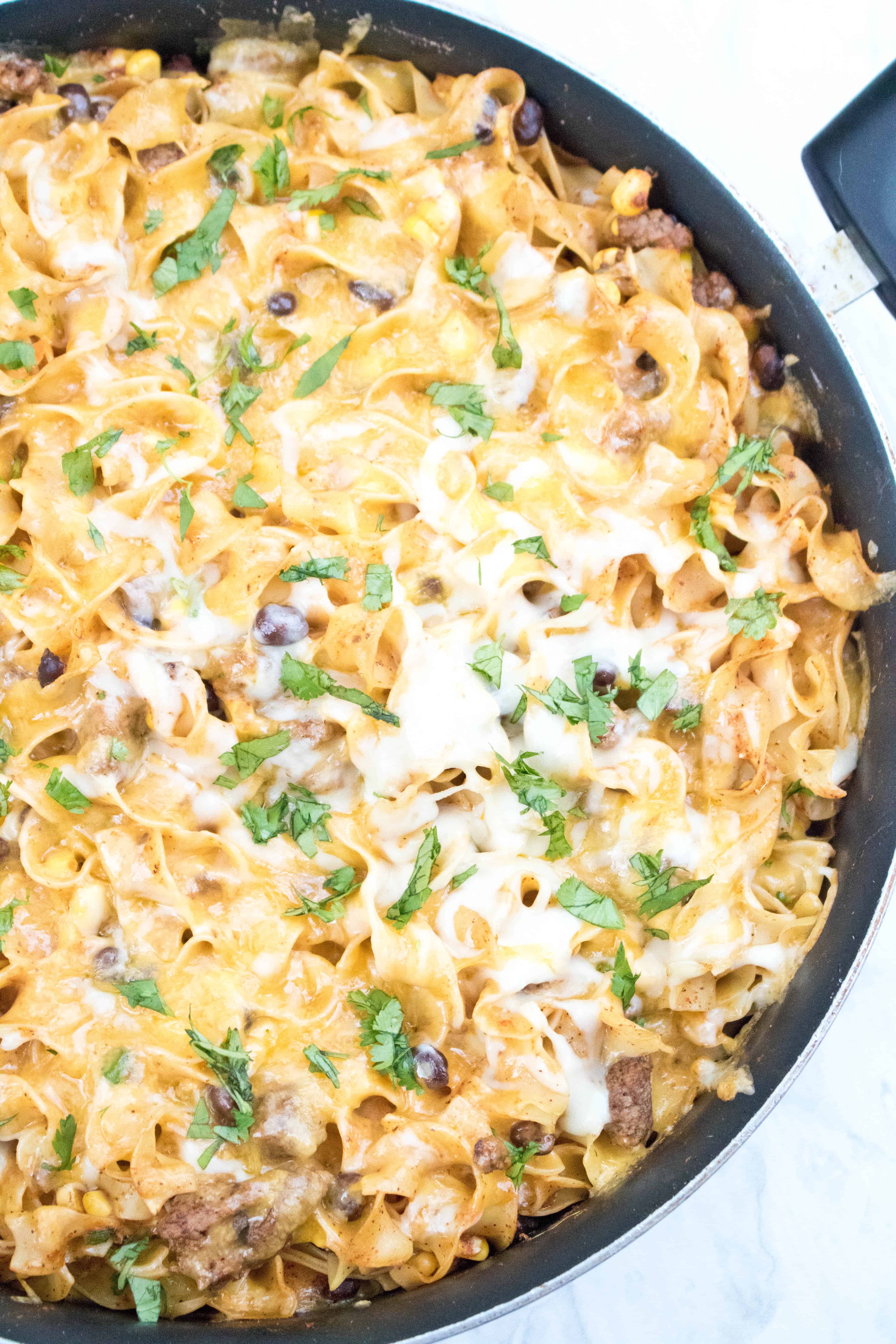 This Enchilada Skillet Pasta is loaded with flavor and cheese making it a delicious, easy and comfort food at it's finest!