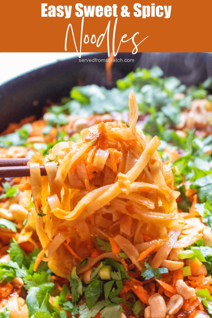 chopsticks holding up some noodles in a pan with carrots and cilantro and peanuts with Pinterest pin text.