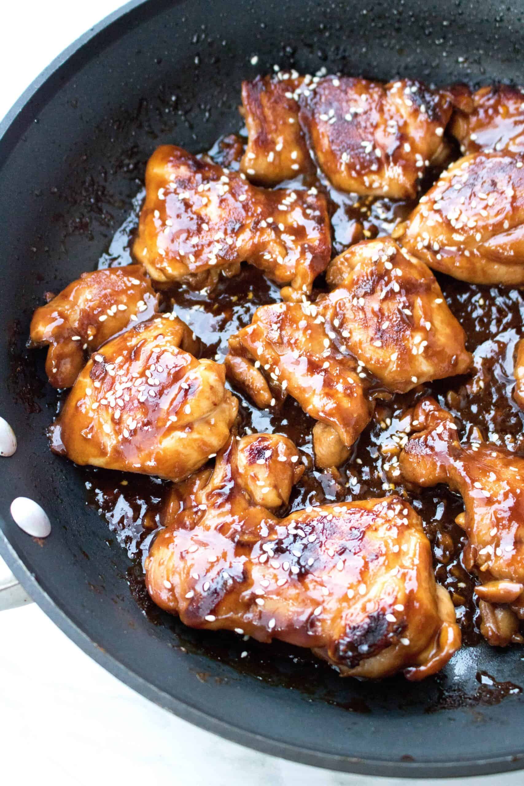 Sweet and Spicy Sriracha Chicken Thighs Served From Scratch