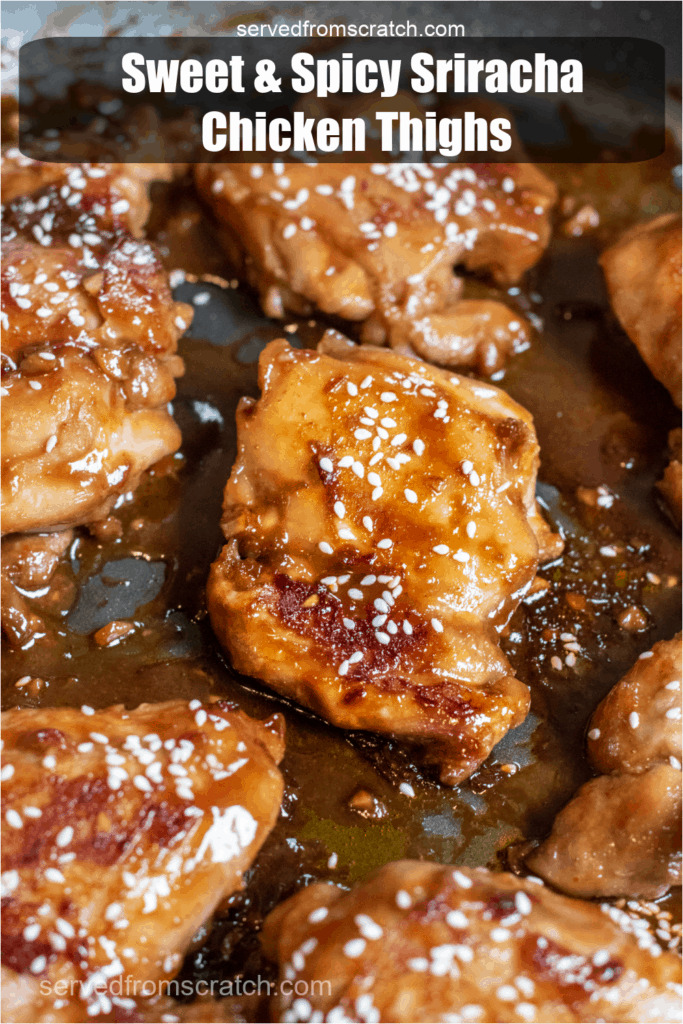 cooked glazed chicken thighs topped with sesame seeds in a pan with Pinterest pin text.