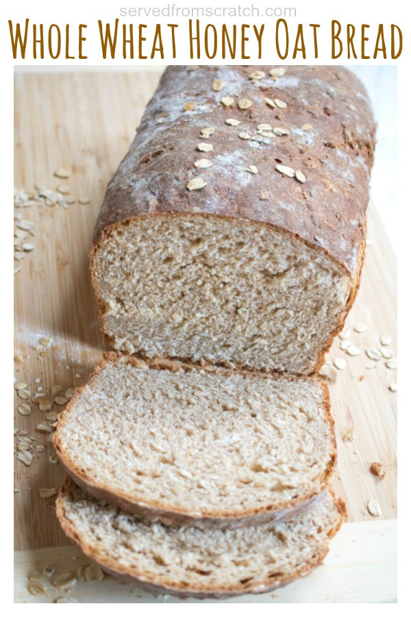 a loaf of whole wheat bread sliced on a cutting board