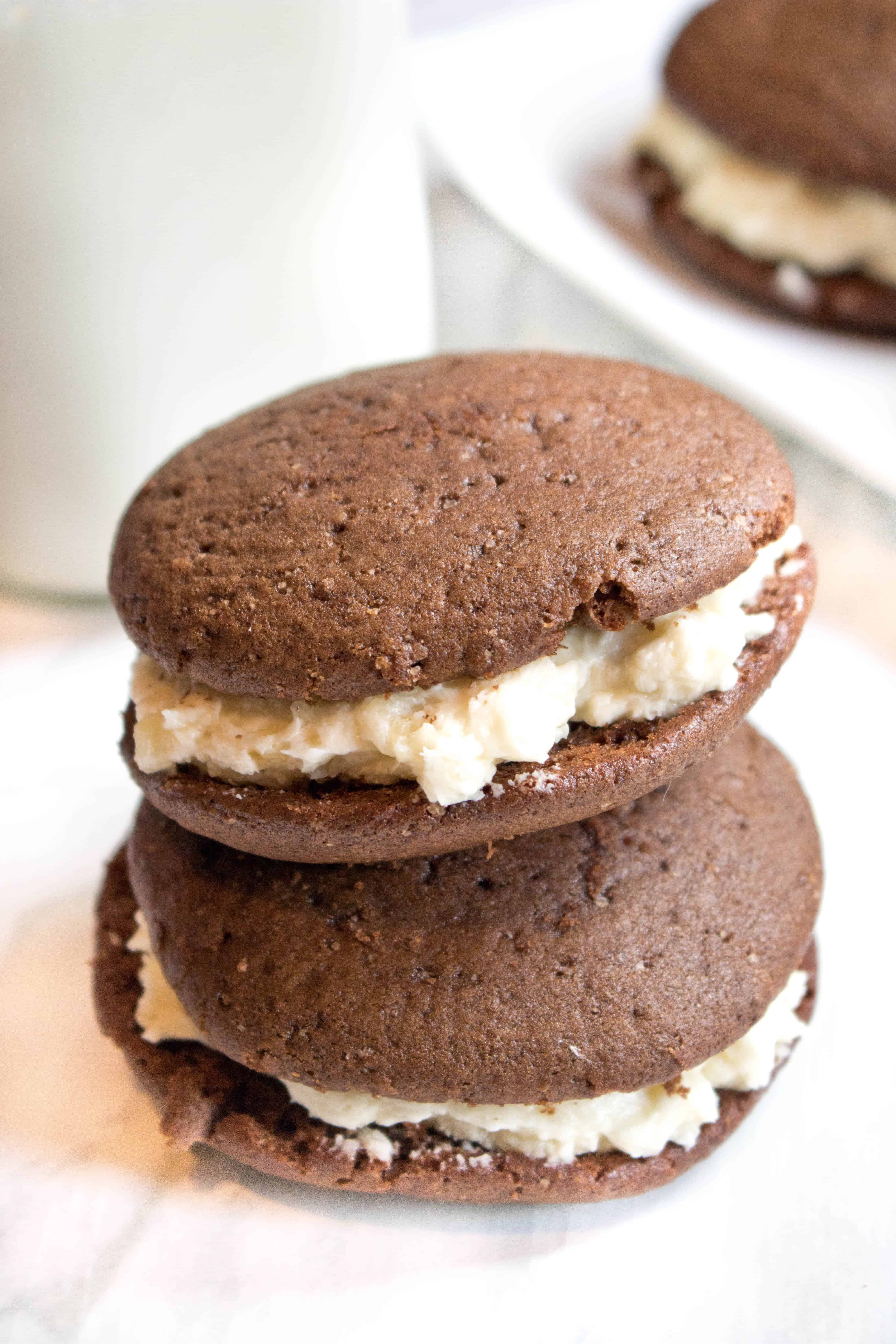 A New England Classic!  These Whoopie Pies From Scratch are two soft chocolate cookies sandwiching a Grandma Pearl's Miracle Frosting! 
