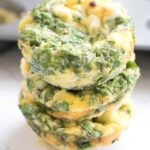 3 stacked egg cups with spinach