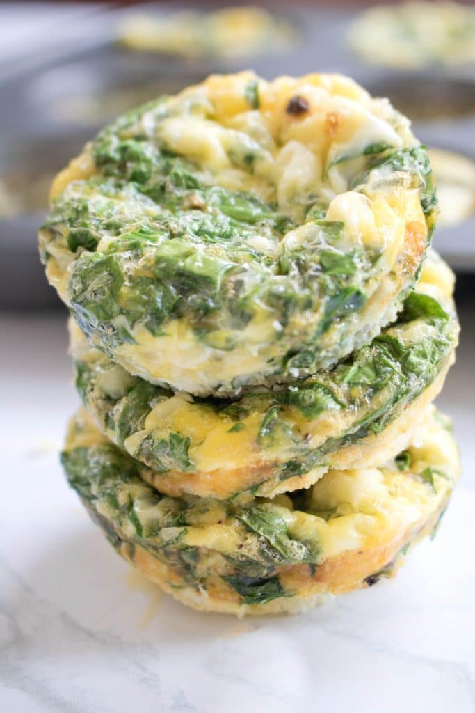 These Spinach and Feta Egg Cups are a delicious, easy to make grab n go breakfast that's packed full of nutrition and flavor!