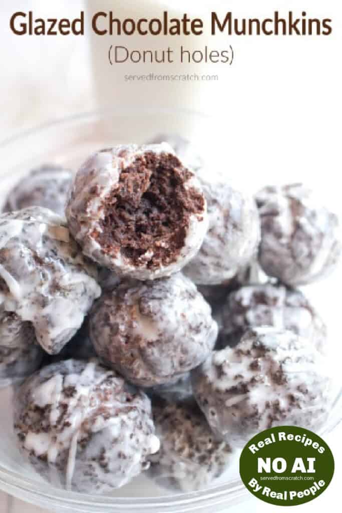 a bowl of chocolate munchkins with one with a bite taken out with Pinterest pin text and NO AI sticker.