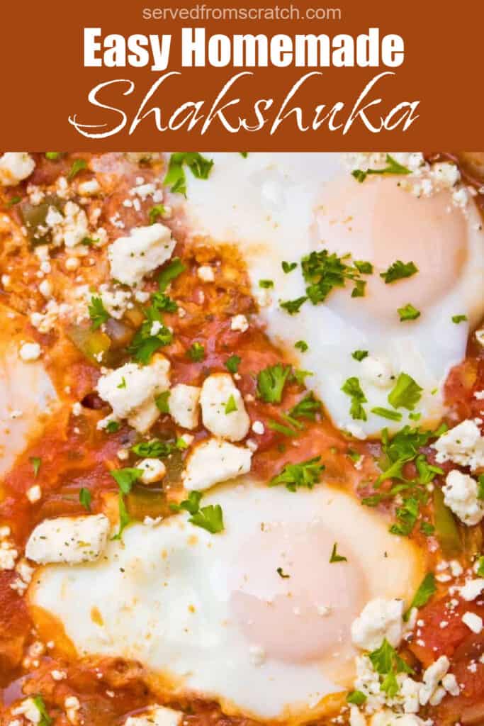 baked eggs in a tomato sauce topped with feta cheese with Pinterest pin text.