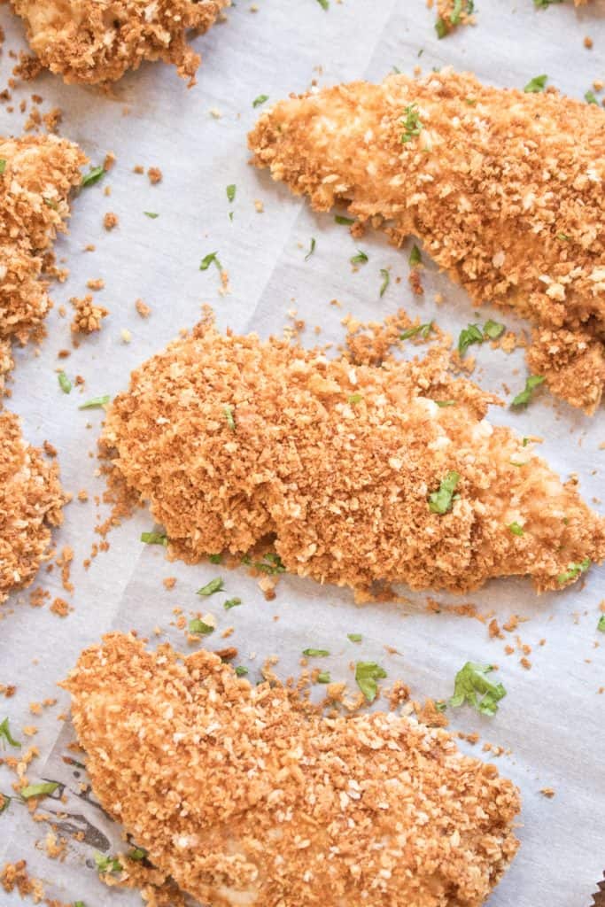 Super crispy and super easy. These Baked Panko Chicken Tenders are the healthy non fried cruncy alternative that's full of flavor and super delicious!