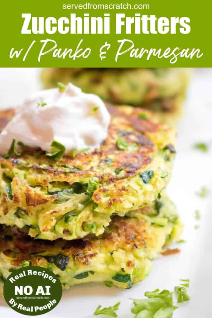 a stack of cooked zucchini fritters with a dollop of sour cream on top with Pinterest pin text and NO AI sticker.
