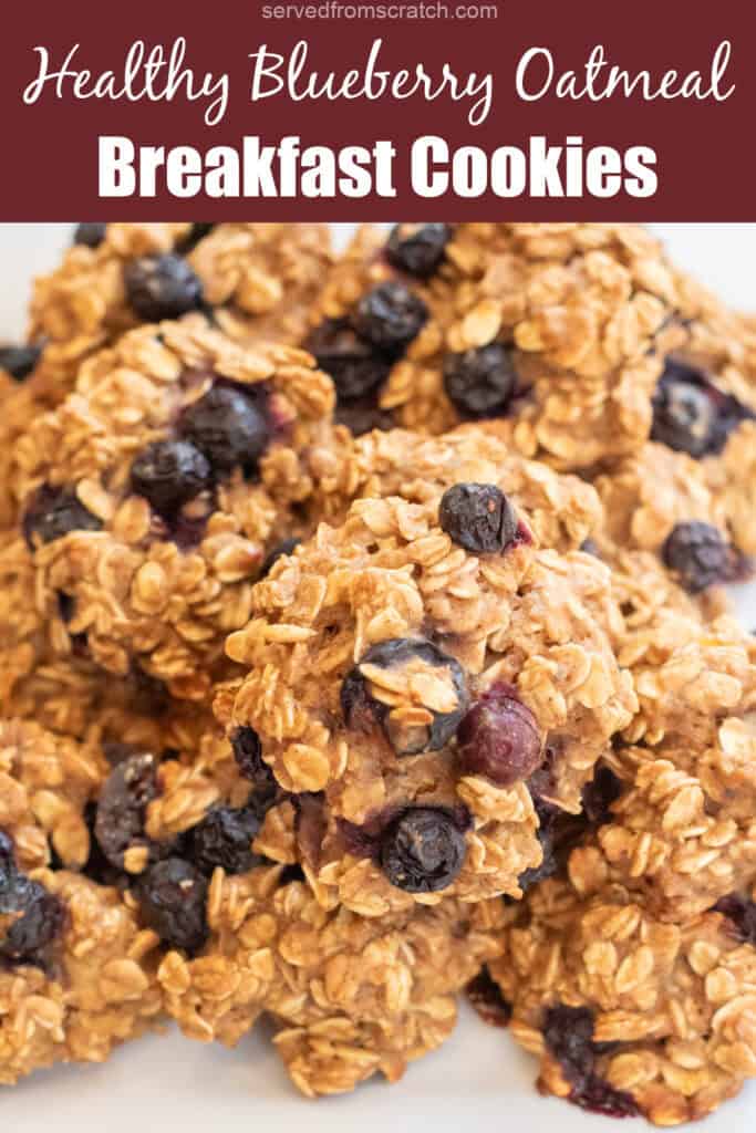 a close up of a plate of oatmeal cookies with blueberries with Pinterest pin text.
