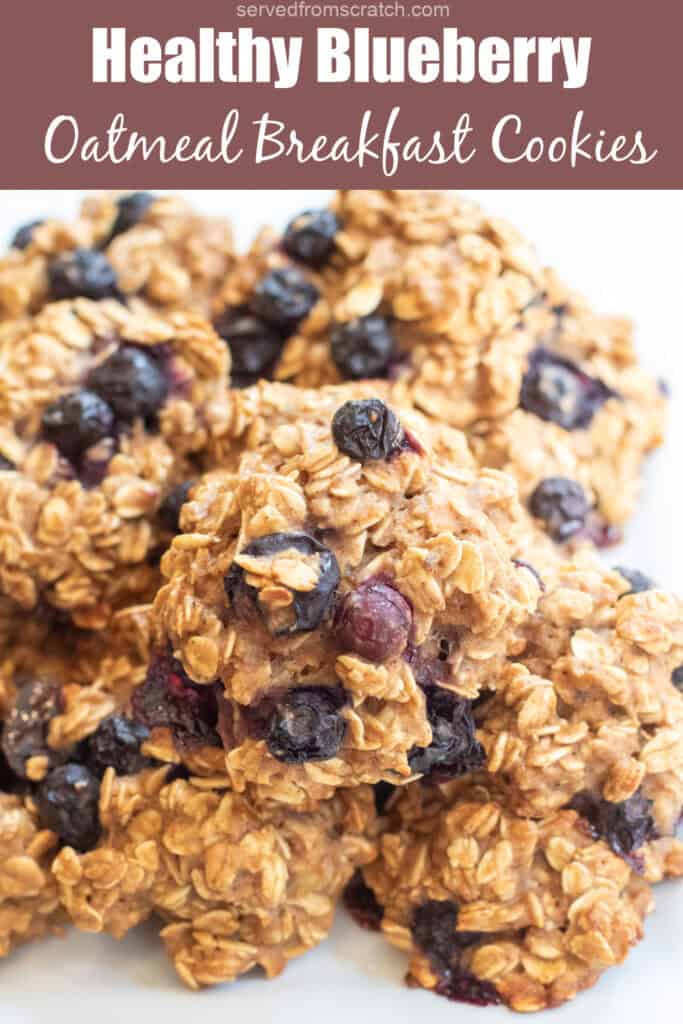a close up of a plate of oatmeal cookies with blueberries with Pinterest pin text.