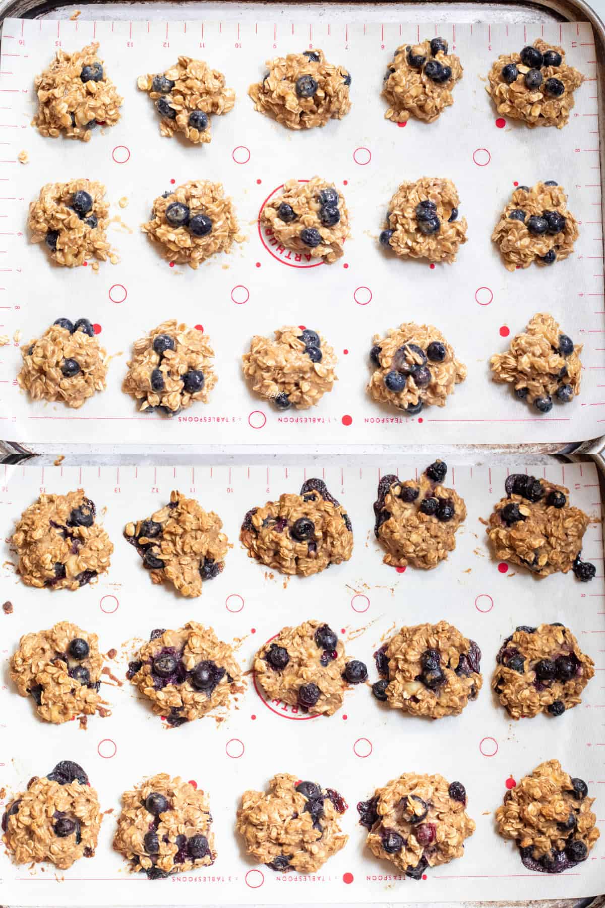 a baking sheet with silicone met with unbaked cookies and then baked cookies.
