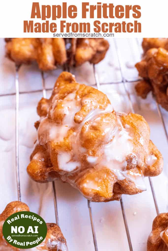 an iced fritter on a cooling race surrounded by other fritters with Pinterest pin text with a NO AI sticker.