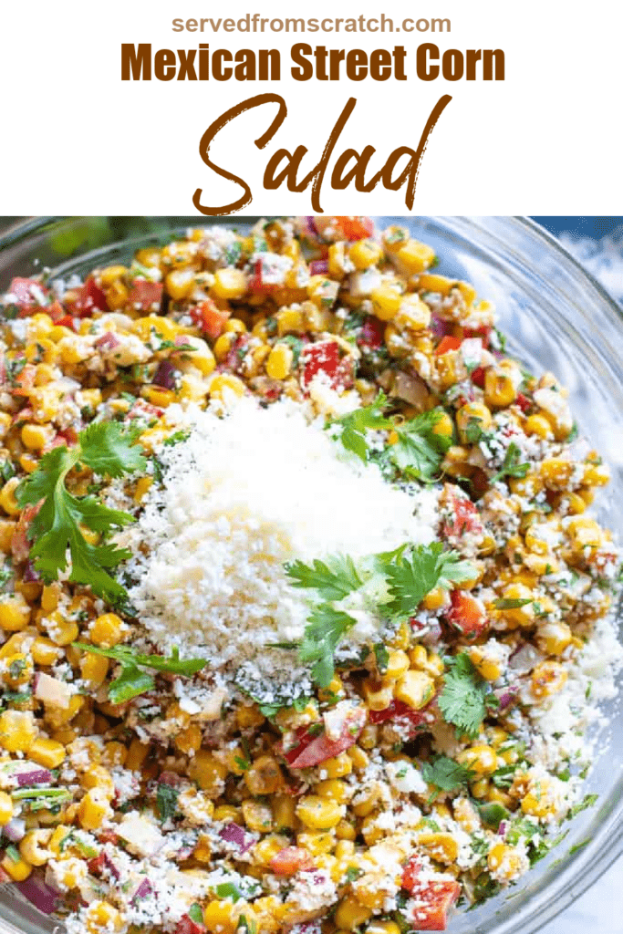 a big bowl of mexican street corn salad topped with cheese and Pinterest pin text.