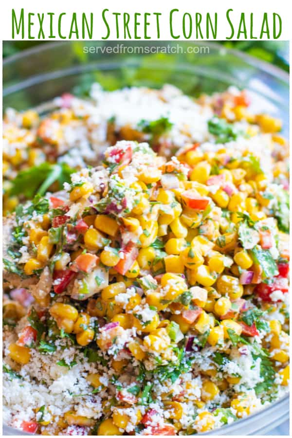 bowl of corn cheese pepper and cilantro with a creamy dressing and Pinterest text.