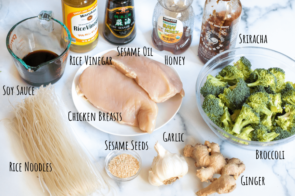 chicken, rice noodles, rice vinegar, a measuring cup of soy, broccoli, ginger, garlic, honey, sesame oil, sriracha.