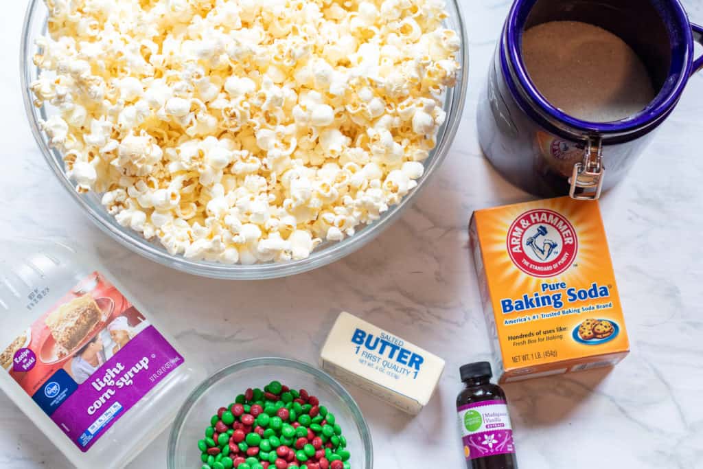 It's a childhood favorite! These Christmas inspired Easy Classic Popcorn Balls are a super fun treat to make for the holidays!