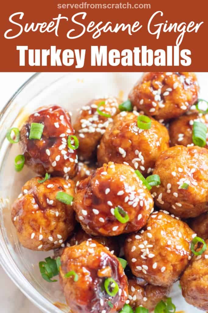 a bowl of glazed meatballs with sesame seeds and green onions and Pinterest pin text.