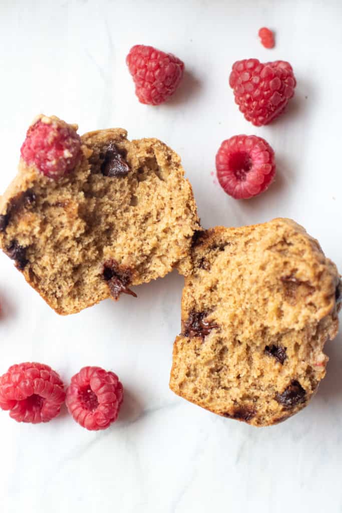 whole wheat raspberry chocolate chip muffin split in half