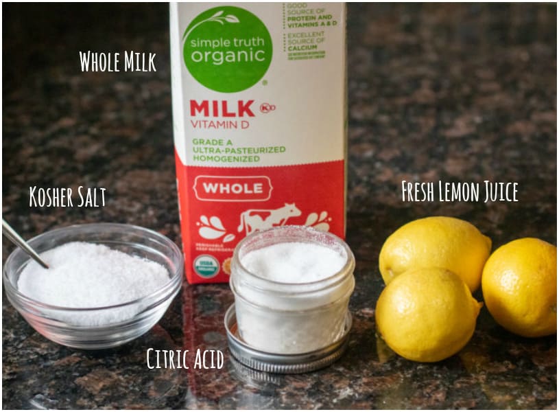 kosher salt, whole milk, citric acid, and lemons on counter