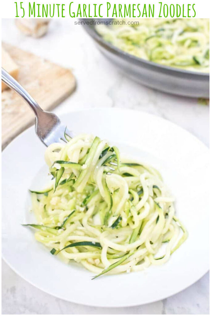 A plate with garlic parmesan zoodles and a fork with zoodles on them and Pinterest pin text.